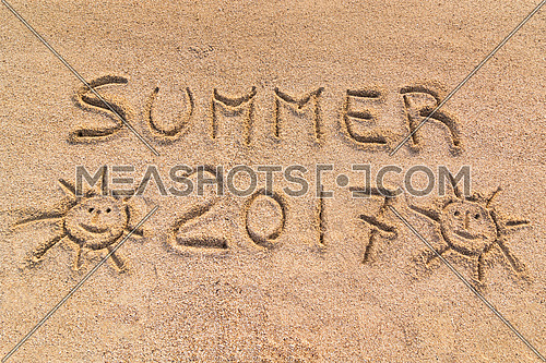 Summer 2017 sign, handwrite on sand.
