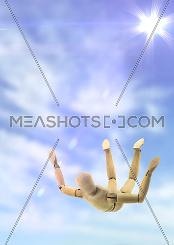 Doll wood flying in the sky in free fall, conceptual image