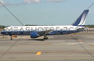 Plane taxis on runway (1 of 2)