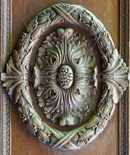 Floral engraved decorations of a royal era wooden ornate door leaf, Manial Palace of Prince Mohammed Ali, Cairo, Egypt