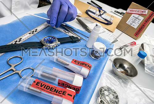 Police scientist working in Criminalistic Lab, victim clock analysis for murder, conceptual image