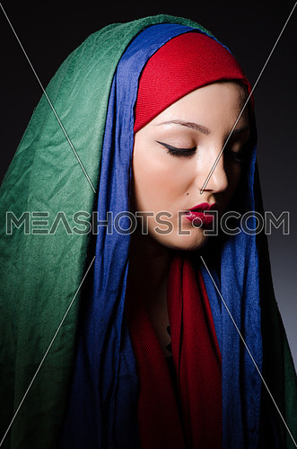 Portrait of the young woman with headscarf