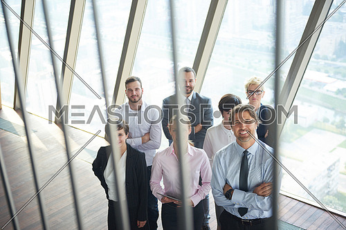 diverse business people group standing together as team  in modern bright office interior