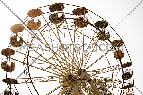 An abandond ferris wheel in a park