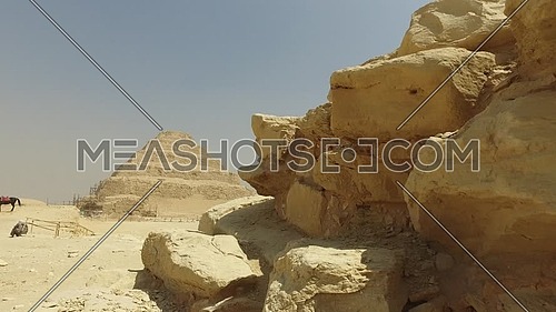 Reveal shot for Saqqara Pyramid in Giza at Day.