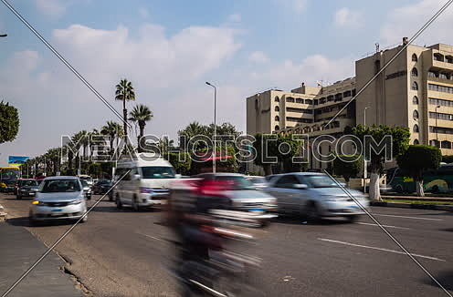 Fixed Shot for traffic at Salah Salim Street showing Le Meridien Hotel in background at Daytime