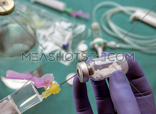Several Vials And Syringe In Laboratory, Conceptual Image