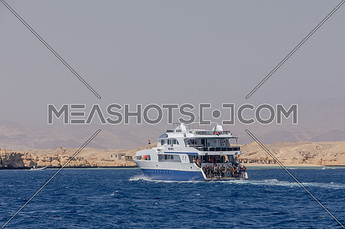 Long shot for a yacht in the Red Sea by day