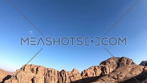 Tilt up shot for exploring Sinai/moses  Mountain at sunset.