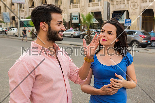 young couple having a discussion in the street in korba area at day