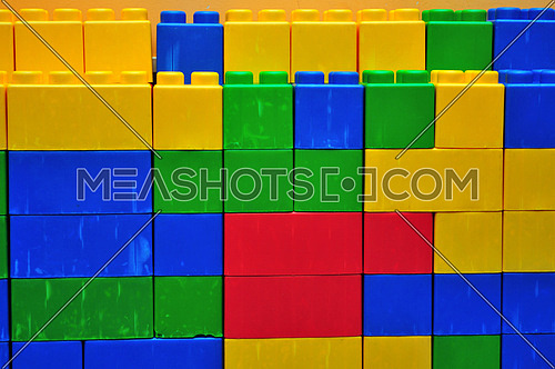 colorful brick toy background in child playground