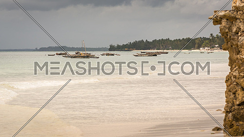 Pictured fishing ships anchored in the bay to the island of Zanzibar, Tanzania.