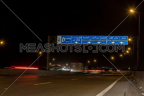 Long shot for Cars moving at Cairo-Alexandria Desert Road at Night