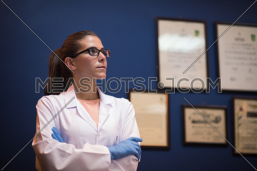 portrait of a young middle eastern woman in the office of modern laboratories