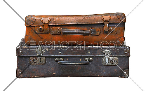 Stack of two old vintage antique grunge travel luggage brown leather suitcase trunks isolated on white background, close up, low angle side view