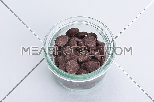 nuts and dry fruits mix healthy organic food mix in glass bowls isolated on white background
