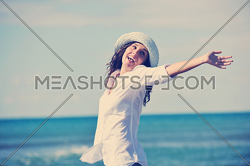 happy young woman relax onbeautiful  beach at morning