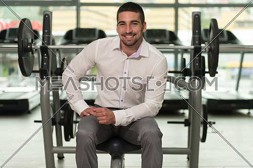 Business Man Resting After Exercise In Gym