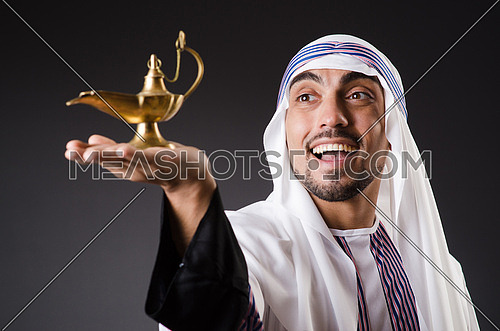 Arab with lamp isolated on the white