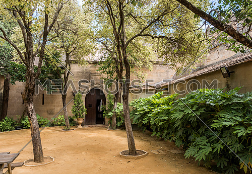 Almodovar del Rio, Cordoba, Spain - June 9, 2018: Gardens inside access to homage tower, It is a fortitude of Moslem origin, it was a Roman fort and the current building has definitely origin Berber, placed close to the Guadalquivir, take in Almodovar of the Rio, Spain