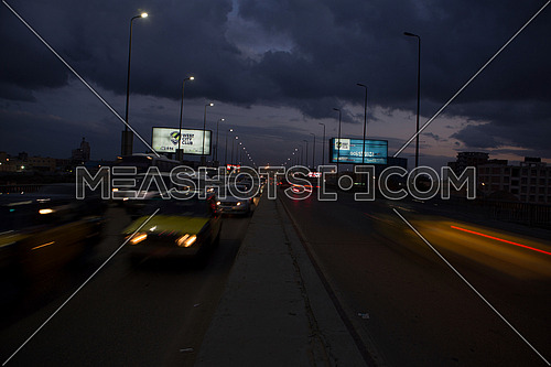 Long shot for traffic on Suez Canal Bridge at Alexandria at night