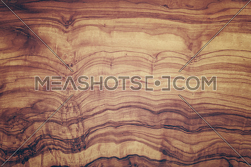 Close up yellow and brown pattern of olive wood woodgrain texture background with old vintage retro colors