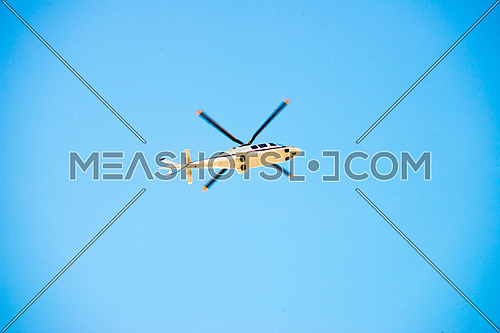 helicopter roaming the sky