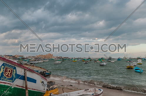 Fixed panorama shot for fishing boats showing Citadel of Qaitbay at Day