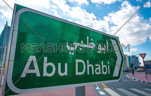 The way to Abu Dhabi sign
