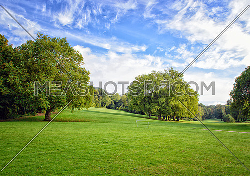Green trees landscape with beautiful sky and clouds