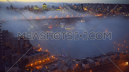Fog over the city of Vancouver during sunrise