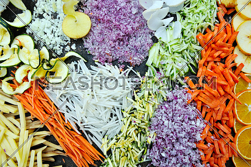 fresh healthy organic food mixed vegetables slice on black background