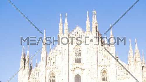 Milan, Italy - May 03, 2021: Crowd of tourists in the square in front of the Duomo of Milan, Italy, many people with masks to protect themselves from