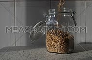 Grain of barley malt in a jar