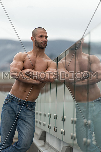 Portrait Of A Physically Fit Young Man Posing Outdoors