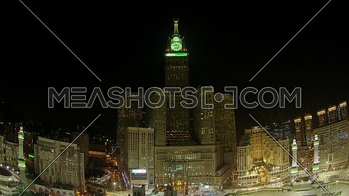 Ariel Shot from drone for Mekkah City showing Kaaba and Royal Clock Tower at Night.