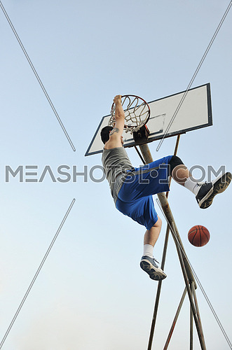 basketball player practicing and posing for basketball and sports athlete concept