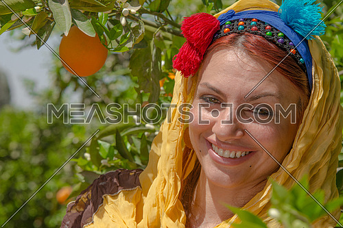 a portrait of an egyptian female farmer wearing traditional clothes