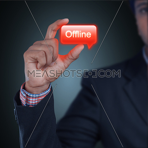 Man showing punching hand in color background