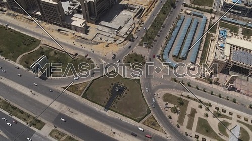 Aerial shot flying over Sheikh Zayed City empty streets during the corona pandemic lockdown by day 10 April 2020
