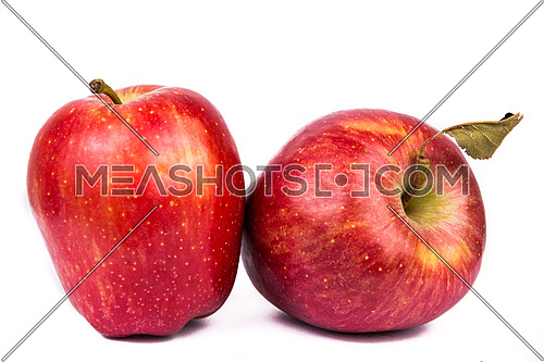 2 Red apples with dead leaf isolated on white