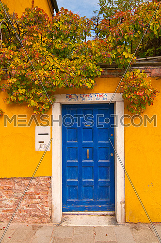 A blue door in the streets of venice