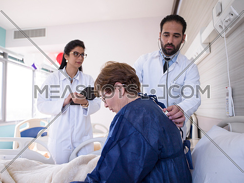 doctor with nurse  and patient at hospital