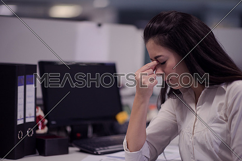 stressed busienss woman at workplace
