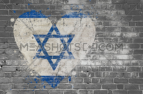 Grunge distressed heqart shaped flag of Israel painted on old weathered grey brick wall