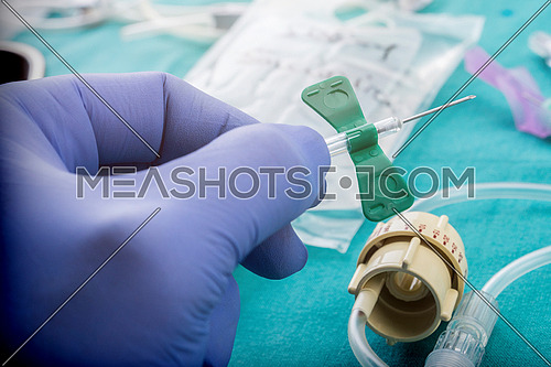 Doctor hold Scalp Vein Needle for Single Use in the hospital
