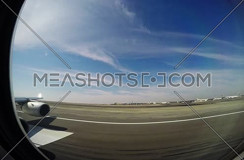 Etihad airways airplane during take off passenger view