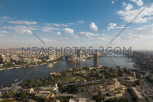 aerial view of modern Greater Cairo city downtown with Nile on a beautiful sunny day with blue sky and clouds capital of Egypt