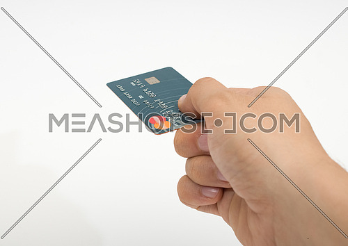 male hand paying with credit card
