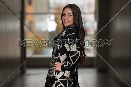 Portrait Of Young And Beautiful Fashion Model In The Shopping Mall - Professional Makeup And Hair Style